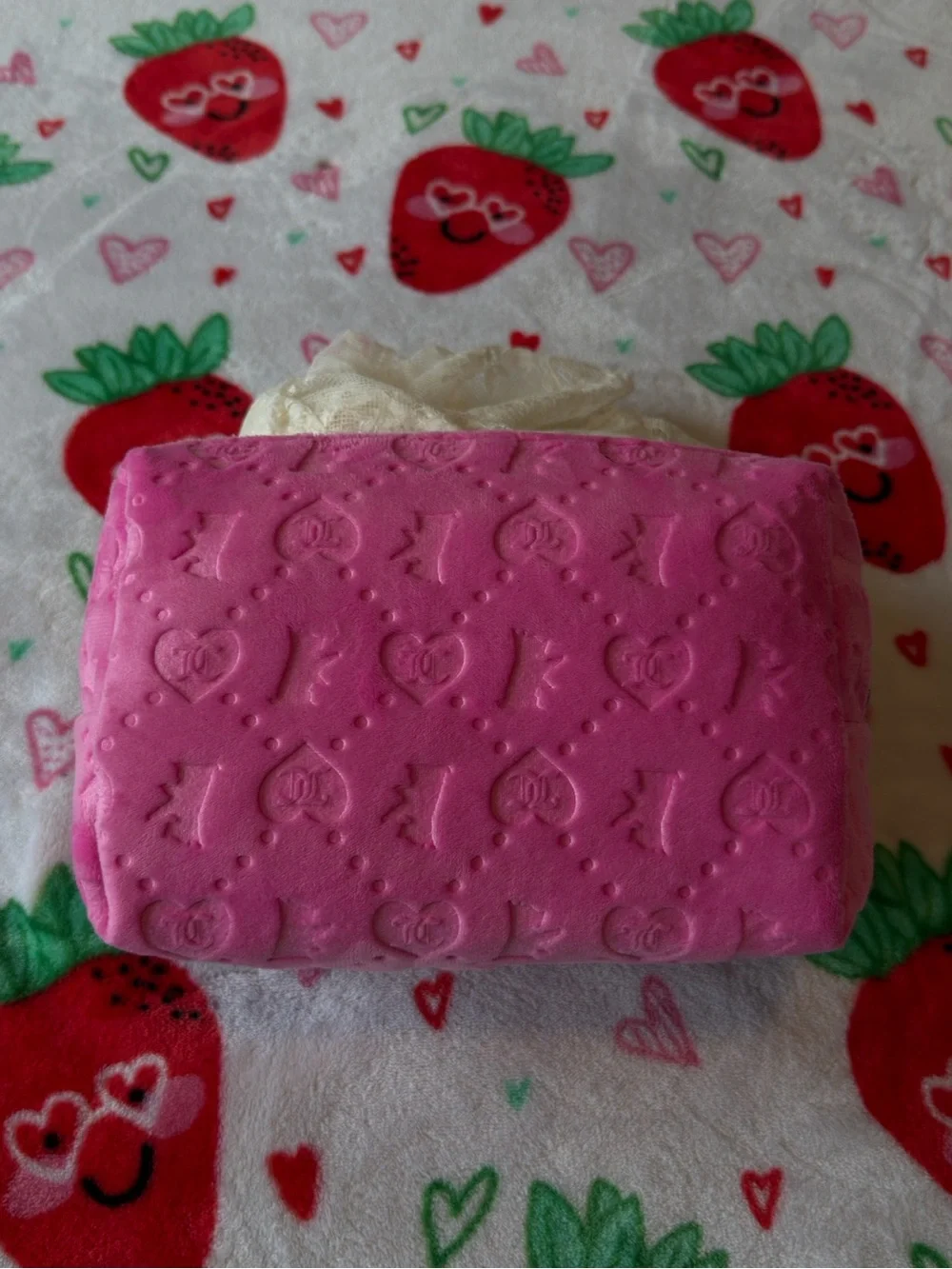 Pink Juicy Couture makeup bag with repeating 'JC' logo pattern 💖